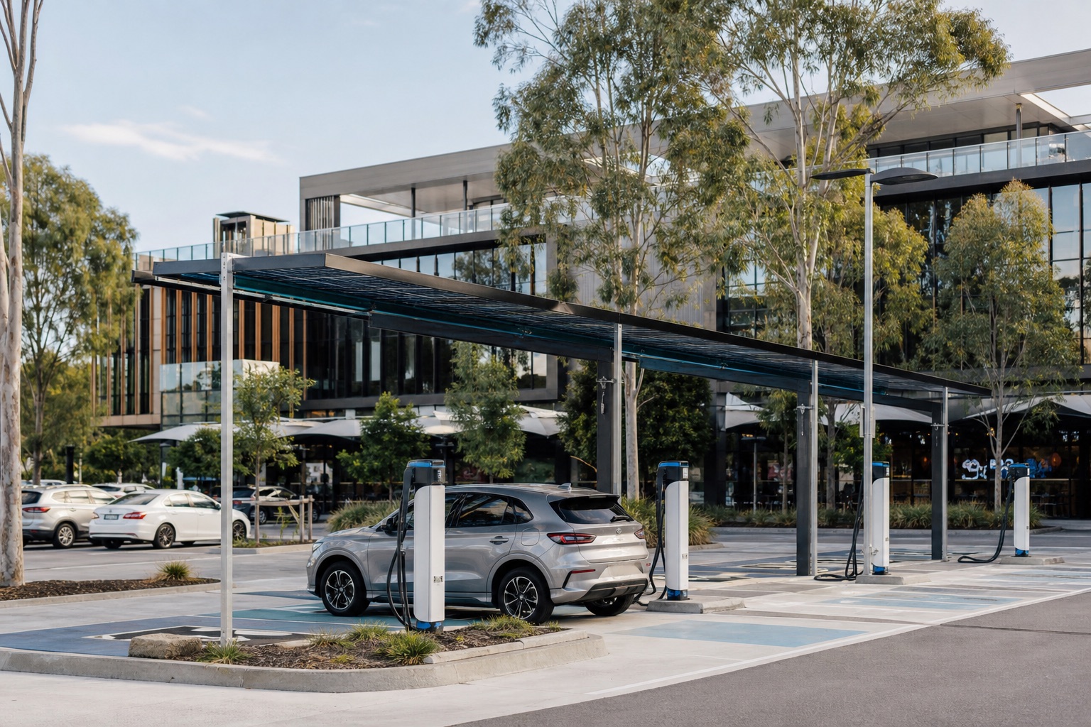 Electric vehicle charging within modern commercial parking infrastructure